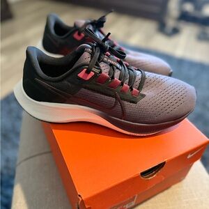 Nike Black and Pink Athletic Shoes with Mesh Upper
